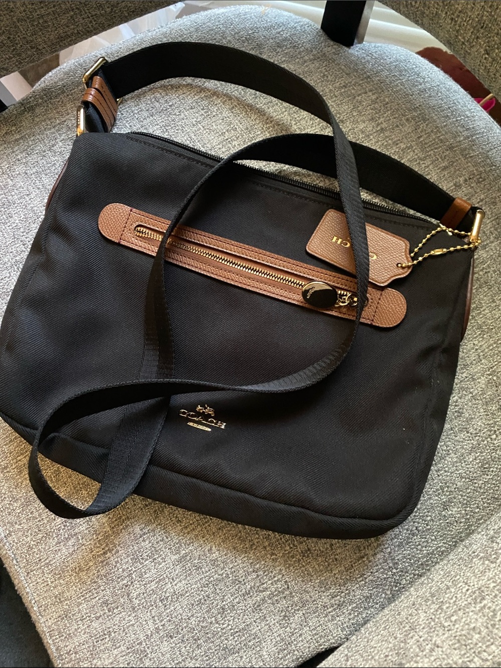 Coach Black Messenger Bag with Brown Trim and Gold Hardware